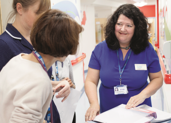 Dr Lynley Marshell, Consultant in Paediatric and Adolescent Oncology Drug Development, talking to colleagues in the OCCYP2_0