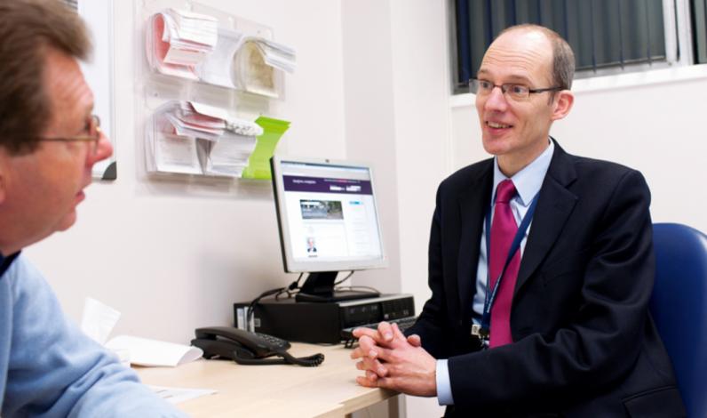 Dr Chris Parker, Consultant Clinical Oncologist, with a patient