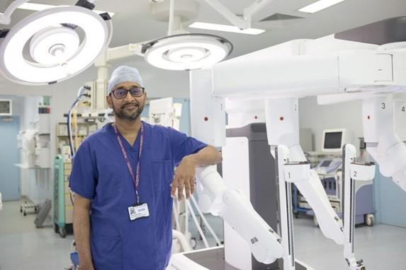 Professor Paleri with a Da Vinci robotic surgical system